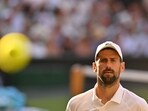 Serbia's Novak Djokovic reacts as he plays against Italy's Jannik Sinner. Serbia's Novak Djokovic reacts as he plays against Italy's Jannik Sinner.