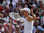 Poland's Iga Swiatek celebrates winning the women's singles final at Wimbledon 