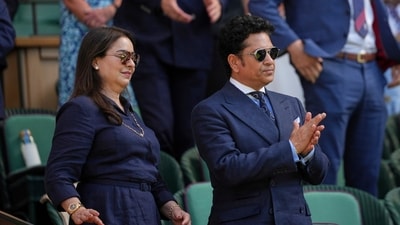 Indian cricket legend, Sachin Tendulkar with his wife Anjali applaud as they sit in the Royal Box on Centre Court on day twelve at the Wimbledon Tennis Championships in London, Friday, July 11. (AP) Indian cricket legend, Sachin Tendulkar with his wife Anjali applaud as they sit in the Royal Box on Centre Court on day twelve at the Wimbledon Tennis Championships in London, Friday, July 11. (AP)