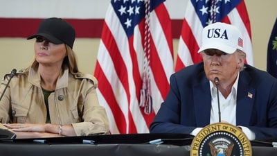 Donald Trump and Melania Trump listen during a roundtable discussion with first responders and local officials at Hill Country Youth Event Center in Kerrville, Texas, during a tour to observe flood damage, Friday, July 11, 2025. AP/PTI(AP07_12_2025_000037A) (AP) Donald Trump and Melania Trump listen during a roundtable discussion with first responders and local officials at Hill Country Youth Event Center in Kerrville, Texas, during a tour to observe flood damage, Friday, July 11, 2025. AP/PTI(AP07_12_2025_000037A) (AP)