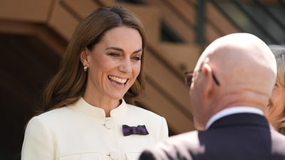 Kate meets Bob Flint, Wimbledon's longest serving Honorary Steward, as she arrives to attend the women's singles final between Poland's Iga Swiątek and Amanda Anisimova of the US at the Wimbledon Tennis Championships in London, Saturday, July 12, 2025. (Jordan Pettitt/Pool via AP) (AP) Kate meets Bob Flint, Wimbledon's longest serving Honorary Steward, as she arrives to attend the women's singles final between Poland's Iga Swiątek and Amanda Anisimova of the US at the Wimbledon Tennis Championships in London, Saturday, July 12, 2025. (Jordan Pettitt/Pool via AP) (AP)
