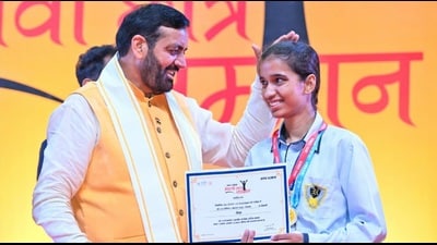 Haryana chief minister felicitating a student during an event in Panchkula on Saturday. (Sourced) Haryana chief minister felicitating a student during an event in Panchkula on Saturday. (Sourced)