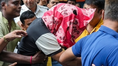 A student of the IIM-Calcutta, accused of the alleged rape of a woman student inside a hostel of the business school, is being produced at a city court in Kolkata. (PTI) A student of the IIM-Calcutta, accused of the alleged rape of a woman student inside a hostel of the business school, is being produced at a city court in Kolkata. (PTI)