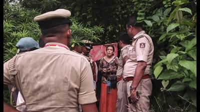 Security personnel rescue a Russian woman and her two children from a remote cave in Ramatirtha hills, in Uttara Kannada district, Karnataka. (PTI) Security personnel rescue a Russian woman and her two children from a remote cave in Ramatirtha hills, in Uttara Kannada district, Karnataka. (PTI)