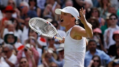 Poland's Iga Swiatek celebrates winning the women's singles final at Wimbledon (REUTERS)