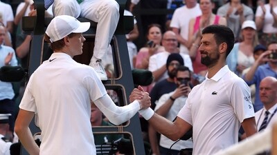 Italy's Jannik Sinner shakes hands with Serbia's Novak Djokovic. (REUTERS)