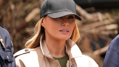First lady Melania Trump stands while greeting first responders as she observes flood damage in Kerrville, Texas, Friday, July 11, 2025. (AP) First lady Melania Trump stands while greeting first responders as she observes flood damage in Kerrville, Texas, Friday, July 11, 2025. (AP)