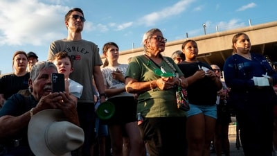 In Kerrville, Texas, Trump and Melania spoke with survivors, local authorities, and first responders while surveying the affected sites. (Getty Images via AFP) In Kerrville, Texas, Trump and Melania spoke with survivors, local authorities, and first responders while surveying the affected sites. (Getty Images via AFP)