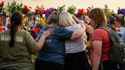 Trump had private, camera-free meetings with families. "We are grieving with you," Melania stated, adding that "Our nation is grieving with you." (Getty Images via AFP) Trump had private, camera-free meetings with families. "We are grieving with you," Melania stated, adding that "Our nation is grieving with you." (Getty Images via AFP)