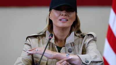 US first lady Melania Trump shows a bracelet she said she was given as a memento to the girls killed in last week's flash flooding during a roundtable meeting at the Hill Country Youth Event Center on July 11, 2025 in Kerrville, Texas. (Getty Images via AFP) US first lady Melania Trump shows a bracelet she said she was given as a memento to the girls killed in last week's flash flooding during a roundtable meeting at the Hill Country Youth Event Center on July 11, 2025 in Kerrville, Texas. (Getty Images via AFP)