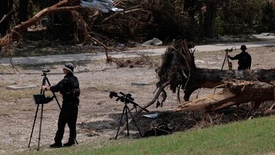 U.S. Secret Service counter sniper team members set up along the flood damaged Guadalupe River as President Donald Trump and first lady Melania Trump visit with state and local leaders, first responders and victims of last week's flash flooding on July 11, 2025 in Kerrville, Texas. (Getty Images via AFP) U.S. Secret Service counter sniper team members set up along the flood damaged Guadalupe River as President Donald Trump and first lady Melania Trump visit with state and local leaders, first responders and victims of last week's flash flooding on July 11, 2025 in Kerrville, Texas. (Getty Images via AFP)