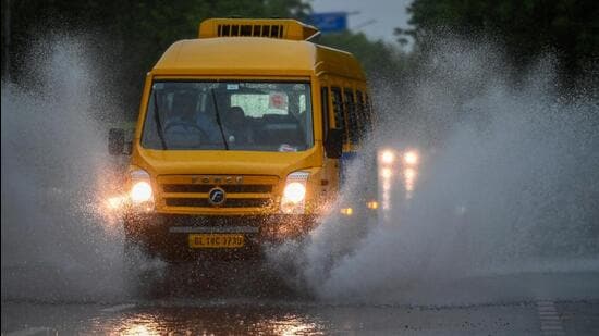 A waterlogged stretch of DSC Road after early morning rains in Noida on July 7. (Sunil Ghosh/HT Photo)
