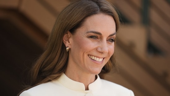 Without one very unique piece, her Wimbledon ensemble would not have been complete: the purple and green bow tie pin, which symbolizes her patronage of the All England Lawn Tennis and Croquet Club. Queen Elizabeth relinquished the patronage to Kate in 2016.(AP)