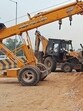 A crane lifts the overturned truck on the elevated flyover connecting the bus stand to Ferozepur Road in Ludhiana on Saturday. (HT Photo) A crane lifts the overturned truck on the elevated flyover connecting the bus stand to Ferozepur Road in Ludhiana on Saturday. (HT Photo)