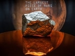 The meteorite NWA 16788, the largest known piece of Mars on Earth, is displayed in Sotheby’s Natural History auction in New York City.