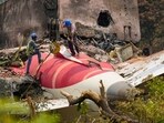 Wreckage of the crashed Air India plane being lifted by a crane, in Ahmedabad, Gujarat, on June 14. Wreckage of the crashed Air India plane being lifted by a crane, in Ahmedabad, Gujarat, on June 14.