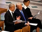 Donald Trump speaks with former U.S. President Barack Obama as Melania Trump looks on Donald Trump speaks with former U.S. President Barack Obama as Melania Trump looks on