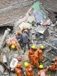 Rescuers and Delhi Police personnel carry out rescue operations on Saturday. (Sanchit Khanna/HT Photo)