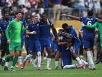 Chelsea's Cole Palmer and Tosin Adarabioyo and teammates celebrate winning the FIFA Club World Cup