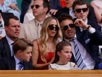 Princess Charlotte lit up with a bright "wow,” while Prince George stayed cool at Wimbledon. REUTERS/Andrew Couldridge