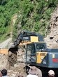 Vehicle stranded after land slide at four miles Bindravani near Mandi on Sunday. (Birbal Sharma/HT) Vehicle stranded after land slide at four miles Bindravani near Mandi on Sunday. (Birbal Sharma/HT)