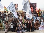 Supporters of the Balochistan National Party (BNP) carry posters of arrested Baloch activist Mahrang Baloch during a protest in Quetta.
