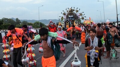 In the Kanwar Yatra procession, kanwariyas collect water from a river and carry it hundreds of kilometres to offer it to the shrines of Lord Shiva. (ANI) In the Kanwar Yatra procession, kanwariyas collect water from a river and carry it hundreds of kilometres to offer it to the shrines of Lord Shiva. (ANI)