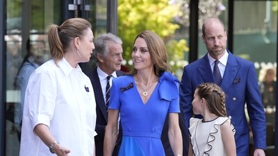 Kate and Wills have been joined by two of their three children - George, 11, and Charlotte, 10 - for the marathon match. (AP)