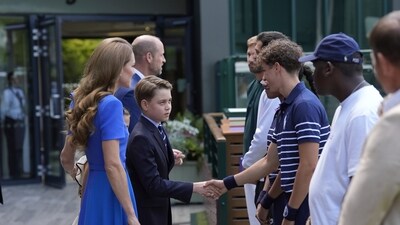 The family was beaming as they arrived together before the final and were shown around the players' lounge to a special greeting party. (AP)