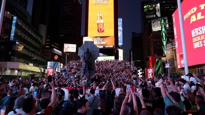 Paris Saint-Germain fans gather at Times Square, cheering and showing solidarity ahead of the FIFA Club World Cup final against Chelsea on July 13. (Photo by FRANCK FIFE / AFP) (AFP) Paris Saint-Germain fans gather at Times Square, cheering and showing solidarity ahead of the FIFA Club World Cup final against Chelsea on July 13. (Photo by FRANCK FIFE / AFP) (AFP)