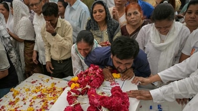 Relatives mourning by the coffins of victims, who were killed in the Air India flight AI171 crash. (Dibyangshu Sarkar/AFP File) Relatives mourning by the coffins of victims, who were killed in the Air India flight AI171 crash. (Dibyangshu Sarkar/AFP File)