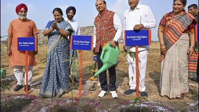 LG VK Saxena and chief minister Rekha Gupta at a bamboo plantation drive at Okhla landfill site on June 6. (PTI) LG VK Saxena and chief minister Rekha Gupta at a bamboo plantation drive at Okhla landfill site on June 6. (PTI)