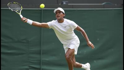 Ronit Karki in the boys' singles final at the Wimbledon Tennis Championships in London. (AP) Ronit Karki in the boys' singles final at the Wimbledon Tennis Championships in London. (AP)