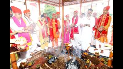 Shri Mata Vaishno Devi shrine board CEO Anshul Garg and other officials performing yagya in Katra on Sunday . (HT Photo) Shri Mata Vaishno Devi shrine board CEO Anshul Garg and other officials performing yagya in Katra on Sunday . (HT Photo)