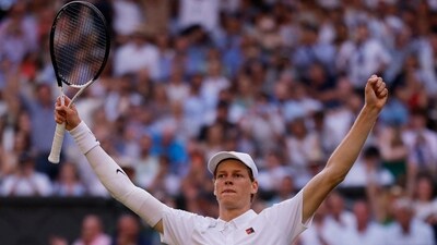 Italy's Jannik Sinner celebrates after winning the men's singles final against Spain's Carlos Alcaraz. (REUTERS)