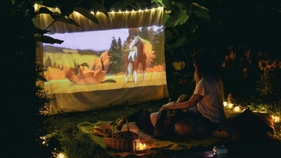 Here are five budget-friendly projectors under  ₹60,000 that offer a theatre-like experience at home. (Pexels)