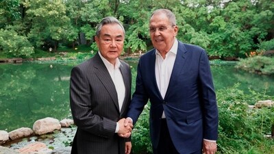 Russian Foreign Minister Sergey Lavrov, shakes hands with Chinese Foreign Minister Wang Yi during their meeting. (AP) Russian Foreign Minister Sergey Lavrov, shakes hands with Chinese Foreign Minister Wang Yi during their meeting. (AP)