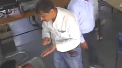 Bhind DM Sanjeev Srivastava turned towards Rathore again, asking him,” Where is your paper?” and went on to slap him twice. (X/ MP Breaking) Bhind DM Sanjeev Srivastava turned towards Rathore again, asking him,” Where is your paper?” and went on to slap him twice. (X/ MP Breaking)