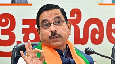 Union minister Pralhad Joshi said that both Siddaramaiah and Shivakumar have "indulged in a trade to lure MLAs on their side". (PTI) Union minister Pralhad Joshi said that both Siddaramaiah and Shivakumar have "indulged in a trade to lure MLAs on their side". (PTI)