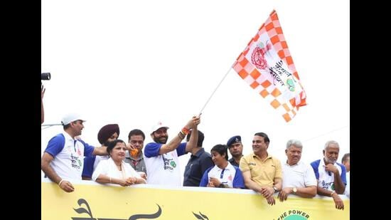 Haryana chief minister Nayab Singh Saini flagging off a marathon in Kaithal on Sunday. (HT Photo)