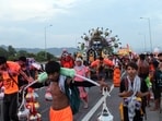 Glass panels being transported on the e-rickshaw driver's vehicle shattered and scattered along a stretch of the Kanwar Yatra route

