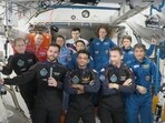 TAxiom Space crew of four, in dark suits, from left, Axiom mission commander Peggy Whitson, Hungary's Tibor Kapu, India's Shubhanshu Shukla and Poland's Slawosz Uznanski-Wisniewski, during a farewell ceremony aboard the International Space Station on Sunday, July 13, 2025. 