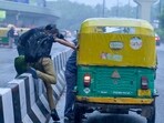 Commuters rush to catch autos near ISBT Kashmere Gate Road in New Delhi after witnessing heavy rain on Monday, July 14, 2025. Commuters rush to catch autos near ISBT Kashmere Gate Road in New Delhi after witnessing heavy rain on Monday, July 14, 2025.