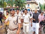 Police personnel investigate after a female student allegedly set herself on fire over sexual harassment at Fakir Mohan (Autonomous) College in Odisha's Balasore district. Police personnel investigate after a female student allegedly set herself on fire over sexual harassment at Fakir Mohan (Autonomous) College in Odisha's Balasore district.