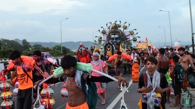 Glass panels being transported on the e-rickshaw driver's vehicle shattered and scattered along a stretch of the Kanwar Yatra route (ANI/Representational) Glass panels being transported on the e-rickshaw driver's vehicle shattered and scattered along a stretch of the Kanwar Yatra route (ANI/Representational)