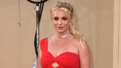 On July 13, Britney shared a video of herself dancing in a pink one-piece swimsuit, black knee-high boots, and a hat. (Jordan Strauss/Invision/AP) On July 13, Britney shared a video of herself dancing in a pink one-piece swimsuit, black knee-high boots, and a hat. (Jordan Strauss/Invision/AP)
