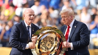 Gianni Infantino, President of FIFA and U.S. President Donald Trump present the FIFA Club World Cup trophy during the FIFA Club World Cup 2025 final match between Chelsea FC and Paris Saint-Germain at MetLife Stadium on July 13, 2025 in East Rutherford, New Jersey. Alex Grimm/Getty Images/AFP (Photo by ALEX GRIMM / GETTY IMAGES NORTH AMERICA / Getty Images via AFP) (Getty Images via AFP) Gianni Infantino, President of FIFA and U.S. President Donald Trump present the FIFA Club World Cup trophy during the FIFA Club World Cup 2025 final match between Chelsea FC and Paris Saint-Germain at MetLife Stadium on July 13, 2025 in East Rutherford, New Jersey. Alex Grimm/Getty Images/AFP (Photo by ALEX GRIMM / GETTY IMAGES NORTH AMERICA / Getty Images via AFP) (Getty Images via AFP)