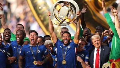 Reece James #24 of Chelsea lifts the FIFA Club World Cup trophy after their team's victory alongside U.S. President Donald Trump following the FIFA Club World Cup 2025 Final match between Chelsea FC and Paris Saint-Germain at MetLife Stadium on July 13, 2025 in East Rutherford, New Jersey. Buda Mendes/Getty Images/AFP (Photo by Buda Mendes / GETTY IMAGES NORTH AMERICA / Getty Images via AFP) (Getty Images via AFP) Reece James #24 of Chelsea lifts the FIFA Club World Cup trophy after their team's victory alongside U.S. President Donald Trump following the FIFA Club World Cup 2025 Final match between Chelsea FC and Paris Saint-Germain at MetLife Stadium on July 13, 2025 in East Rutherford, New Jersey. Buda Mendes/Getty Images/AFP (Photo by Buda Mendes / GETTY IMAGES NORTH AMERICA / Getty Images via AFP) (Getty Images via AFP)