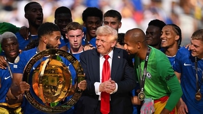 Reece James #24 of Chelsea FC speaks to team as he holds the FIFA Club World Cup trophy after their team's victory as intereacts with U.S. President Donald Trump following the FIFA Club World Cup 2025 Final match between Chelsea FC and Paris Saint-Germain at MetLife Stadium on July 13, 2025 in East Rutherford, New Jersey. David Ramos/Getty Images/AFP (Photo by David Ramos / GETTY IMAGES NORTH AMERICA / Getty Images via AFP) (Getty Images via AFP) Reece James #24 of Chelsea FC speaks to team as he holds the FIFA Club World Cup trophy after their team's victory as intereacts with U.S. President Donald Trump following the FIFA Club World Cup 2025 Final match between Chelsea FC and Paris Saint-Germain at MetLife Stadium on July 13, 2025 in East Rutherford, New Jersey. David Ramos/Getty Images/AFP (Photo by David Ramos / GETTY IMAGES NORTH AMERICA / Getty Images via AFP) (Getty Images via AFP)