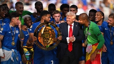 eece James #24 of Chelsea FC holds the FIFA Club World Cup trophy after their team's victory as U.S. President Donald Trump interacts with Robert Sanchez #1 of Chelsea FC following the FIFA Club World Cup 2025 Final match between Chelsea FC and Paris Saint-Germain at MetLife Stadium on July 13, 2025 in East Rutherford, New Jersey. David Ramos/Getty Images/AFP (Photo by David Ramos / GETTY IMAGES NORTH AMERICA / Getty Images via AFP) (Getty Images via AFP) eece James #24 of Chelsea FC holds the FIFA Club World Cup trophy after their team's victory as U.S. President Donald Trump interacts with Robert Sanchez #1 of Chelsea FC following the FIFA Club World Cup 2025 Final match between Chelsea FC and Paris Saint-Germain at MetLife Stadium on July 13, 2025 in East Rutherford, New Jersey. David Ramos/Getty Images/AFP (Photo by David Ramos / GETTY IMAGES NORTH AMERICA / Getty Images via AFP) (Getty Images via AFP)